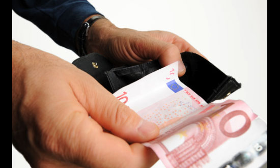 Man Arrested For Handing Out Cash