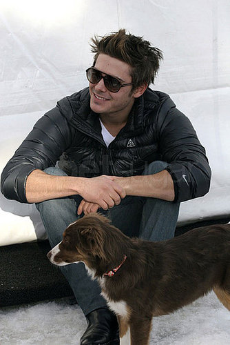 Photos of Zac Efron Playing With Dogs in Aspen Photos of Zac Efron Playing With Dogs in Aspen