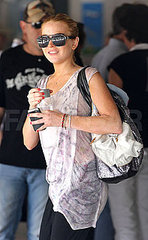 Lindsay Lohan Carries a Sequin Tote on Vacation in St. Barts