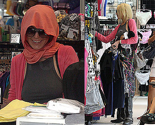 Photos of Lindsay Lohan Covering Up Her Hair While Shopping in LA