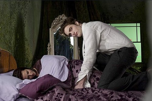 Edward and Bella in Bed and Shirtless Taylor in New Stills From New Moon!