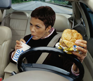 Avoid These 10 Foods While Driving to Keep Insurance Costs Down