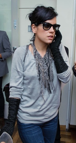Singer Lily Allen Attends the Form Launch Party in London Wearing Black Ruched Gloves