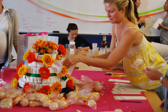 Stuffing the Diaper Cake With the Wishes