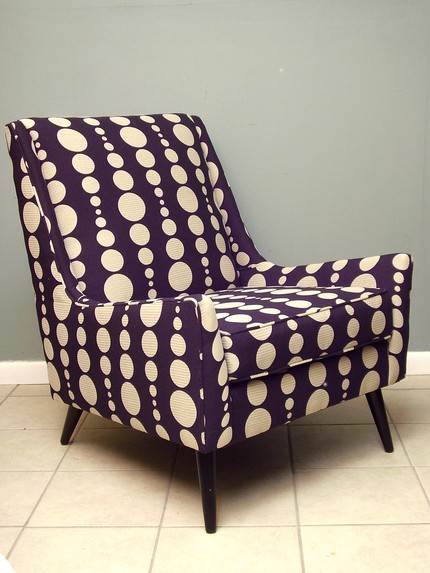 This 1960s-style Modern Danish-Inspired Lounge Chair ($425) has black semigloss painted tapered legs and is newly recovered in Knoll Wide Angle Optics fabric, a 100 percent postconsumer recycled fabric. This 1960s-style Modern Danish-Inspired Lounge Chair ($425) has black semigloss painted tapered legs and is newly recovered in Knoll Wide Angle Optics fabric, a 100 percent postconsumer recycled fabric.
