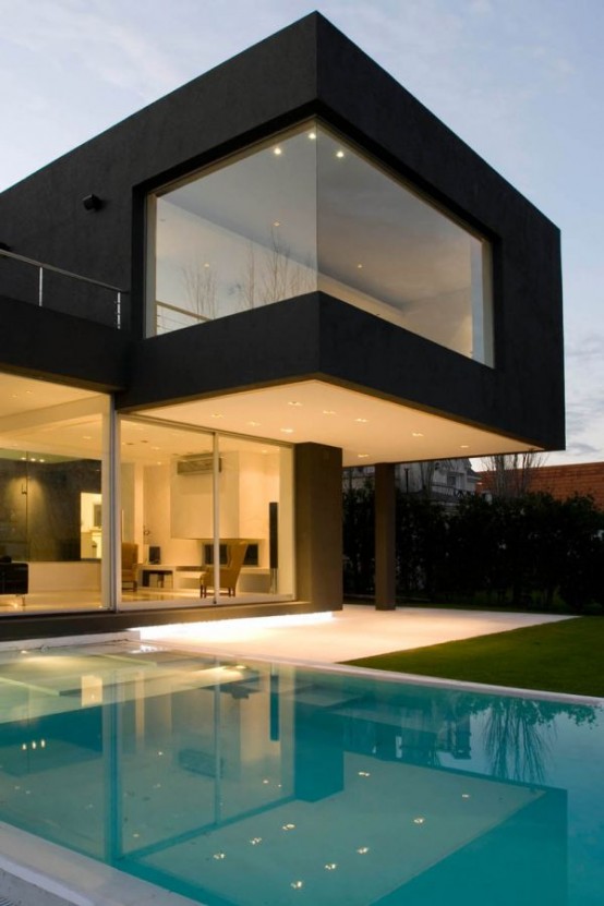 This modern, angular black house is located outside of Buenos Aires. It was designed by Andres Remy Arquitectos.
Source
This modern, angular black house is located outside of Buenos Aires. It was designed by Andres Remy Arquitectos.
Source