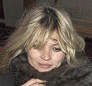 Kate Moss Shows Off the Latest Fashion Accessory