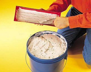 Bank Robber Uses Drywall for Disguise