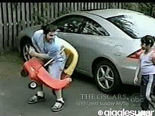 Guy Gets  Stuck in Toy Car