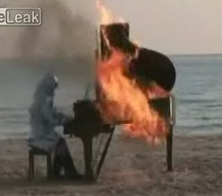 Man Plays Burning Piano