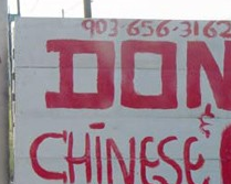 Donuts and Chinese Food Sign