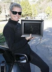 Rebecca Romijn Loves Her New Digital Picture Frame Rebecca Romijn Loves Her New Digital Picture Frame