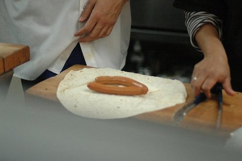 This looks like the start of some sort of burrito dog.
This looks like the start of some sort of burrito dog.