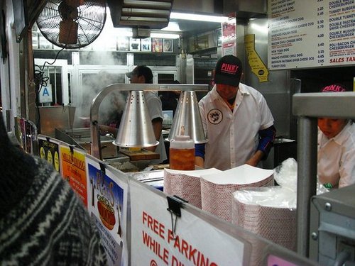 Here they are working hard and making delicious dogs.
Here they are working hard and making delicious dogs.