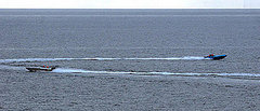 Headline: US and Iran — Battle of Boats and Videos
