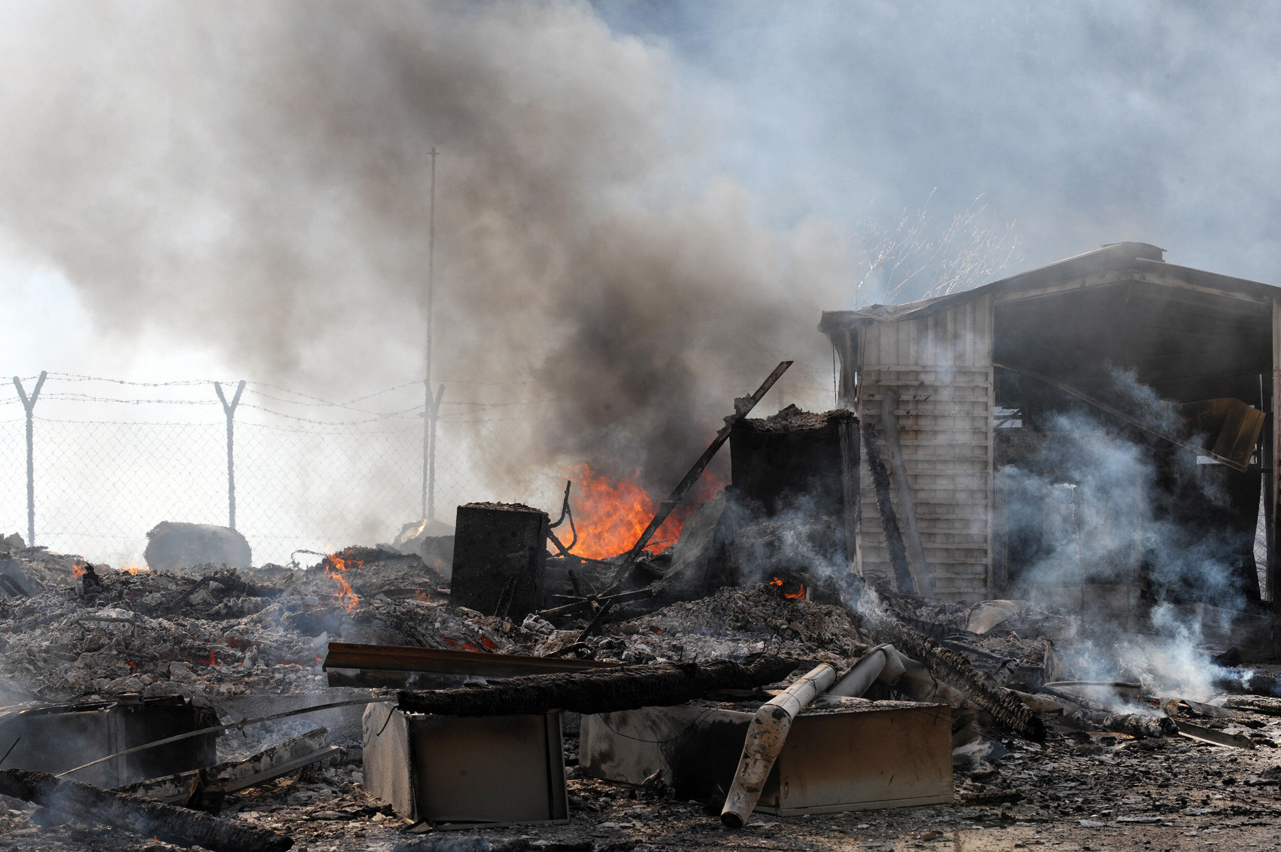 Angry Serbs destroyed two checkpoints on the Kosovo-Serbia border in arson attacks on Tuesday. Angry Serbs destroyed two checkpoints on the Kosovo-Serbia border in arson attacks on Tuesday.