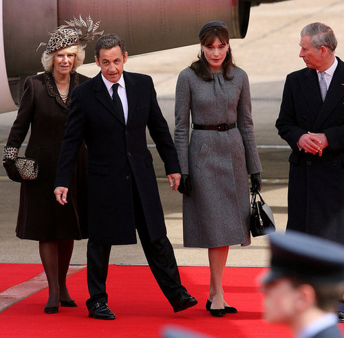 Nicolas Sarkozy and Carla Bruni Arrive in England to Meet the Royal Family