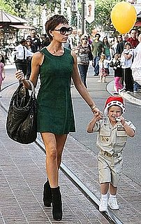 Victoria Beckham Wearing Green Suede Dress In LA