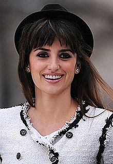 Penelope Cruz Opens the Unbreakable Kiss Mistletoe Installation in Madison Square Park in a White Chanel Suit and Hat