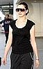 Anne Hathaway at LAX in Black Plastic Sunglasses