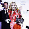 Madonna Auctions a Bag For AIDS Research That Nets More Money Than a Kiss From Clooney