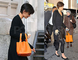 Photos of Katie Holmes Dressed in Halloween Colors Walking Into Theater