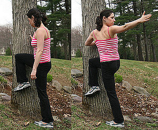 Stretch It: Spinal Twist Against a Tree
