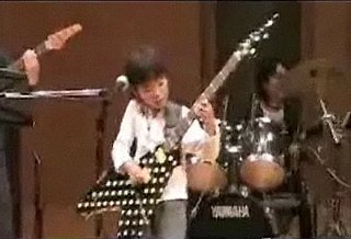 Little Kid Will Kick Your Butt in Guitar Hero