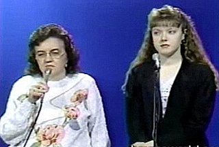 Mother and Daughter Singing Christmas Tunes on Public Access