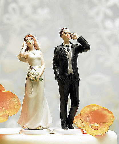 Geeksugar pointed out this tacky cellphone topper ($19.95), and maybe they'd work if you were a long-distance couple, but if you'd rather talk to other folks than your sweetie, maybe a wedding isn't for you.
Geeksugar pointed out this tacky cellphone topper ($19.95), and maybe they'd work if you were a long-distance couple, but if you'd rather talk to other folks than your sweetie, maybe a wedding isn't for you.