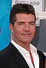 Photos of Shirtless Simon Cowell Sunbathing in Barbados with Sinitta