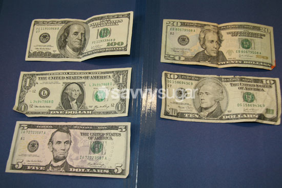 The five and the twenty are the only two that don't frame the presidents' heads. The five and the twenty are the only two that don't frame the presidents' heads.