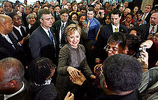 Briefing Book! Secretary of State Clinton Gets Warm Welcome 
