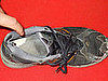 Front Page: Chinese See Footage of Shoe Thrown at Premier