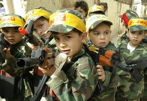 Children in India Burn Their Toy Guns to Protest Violence