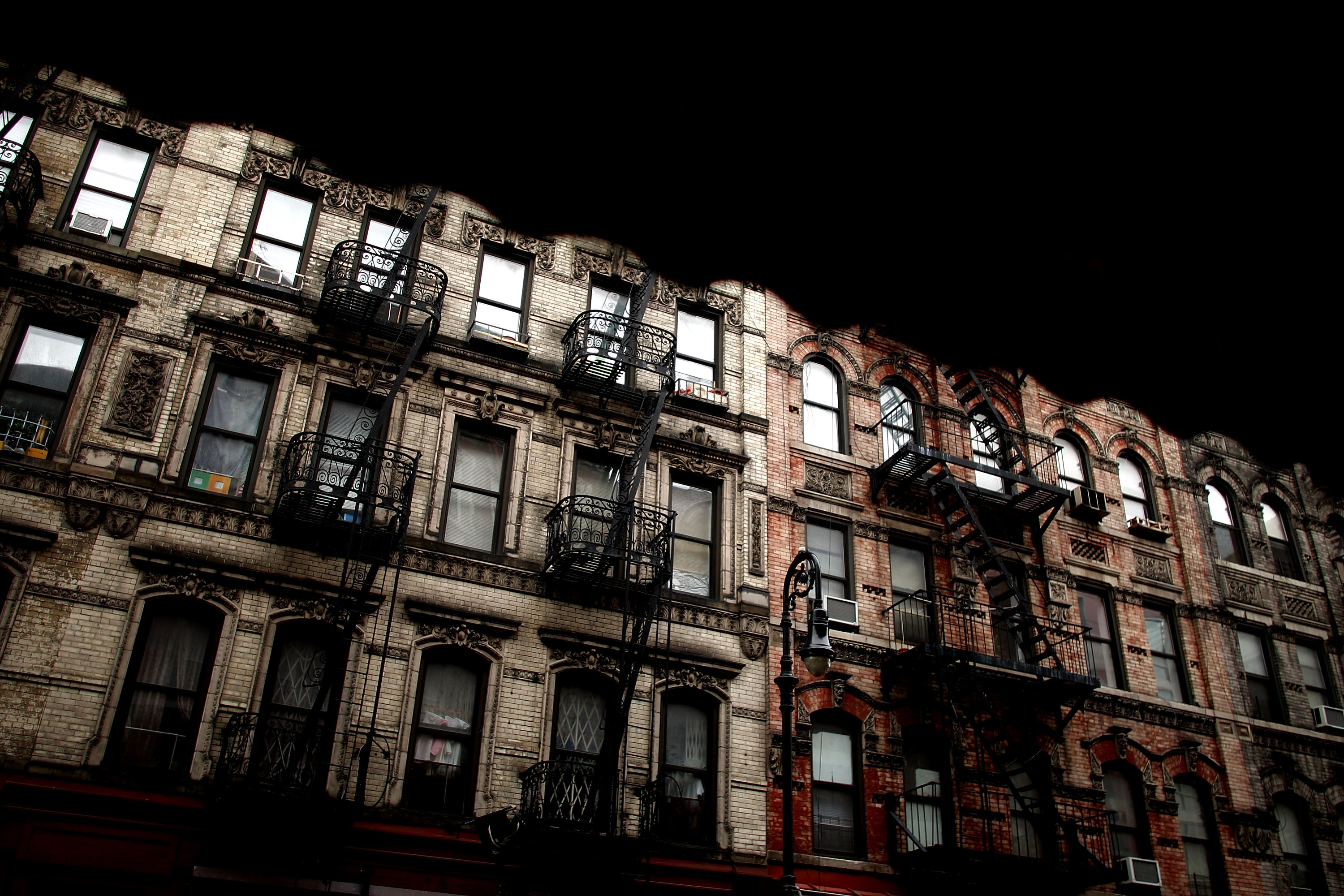 An aging tenement building on Orchard Street in the Lower East Side An aging tenement building on Orchard Street in the Lower East Side