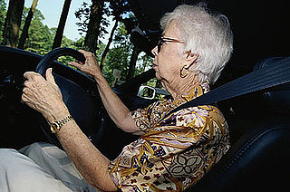 Grandma Drives with Child on Top of Car