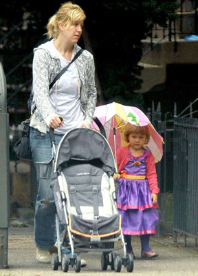 A Wee Matilda Keeps Dry in Her Princess Dress A Wee Matilda Keeps Dry in Her Princess Dress