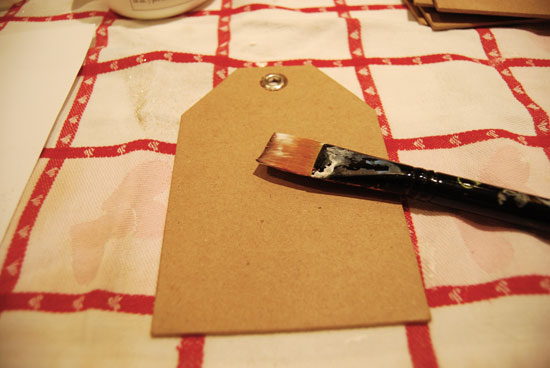 The cardboard tag ready for glue The cardboard tag ready for glue