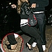 Fall from grace: Fergie trips over in her towering heels