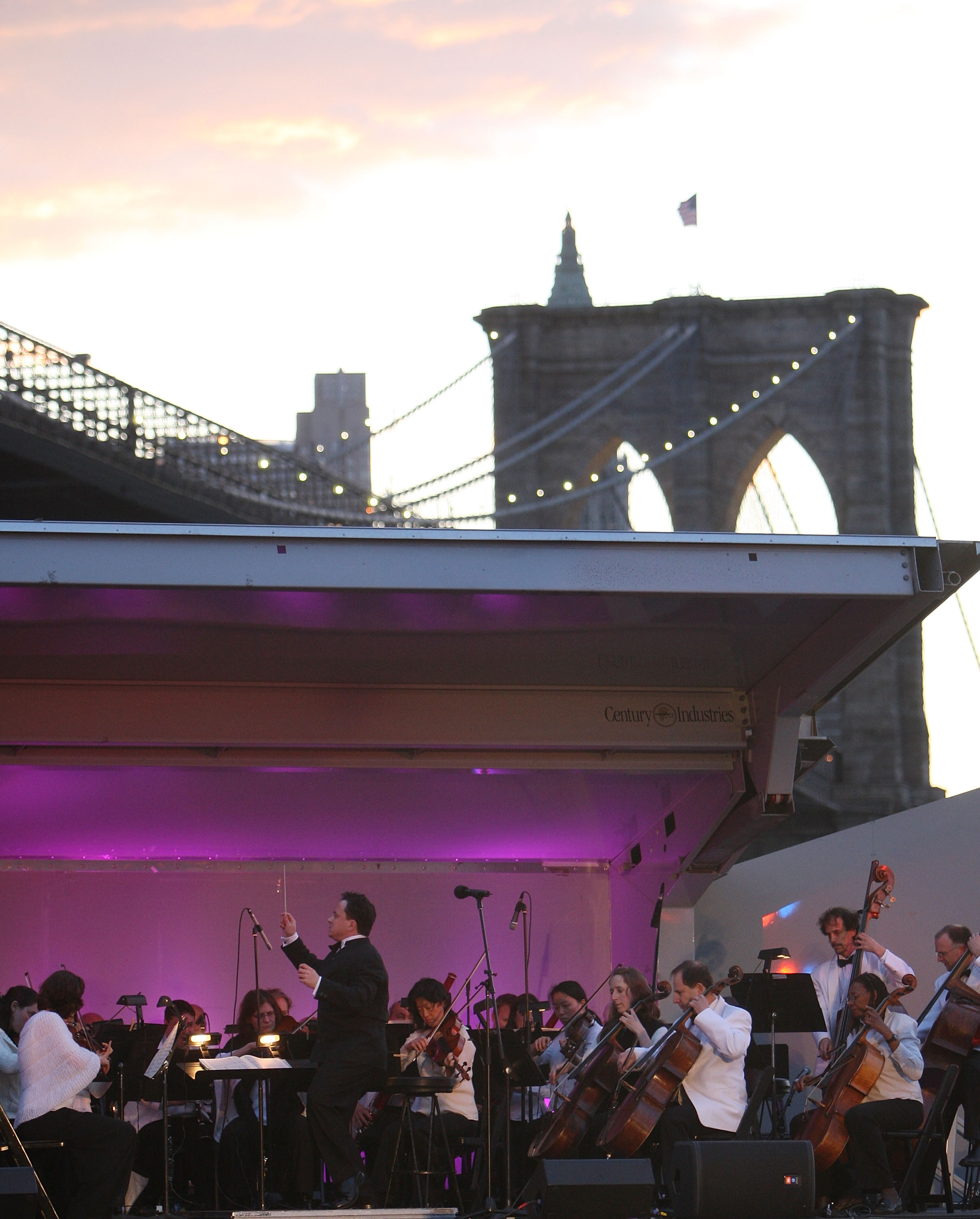 The Brooklyn Philharmonic performs under the Brooklyn Bridge on Thursday. The Brooklyn Philharmonic performs under the Brooklyn Bridge on Thursday.