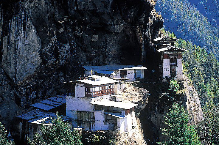 Taktsang monastery at Tiger's Lair, sacred Buddhist cave shrine perched high on cliff. Taktsang monastery at Tiger's Lair, sacred Buddhist cave shrine perched high on cliff.