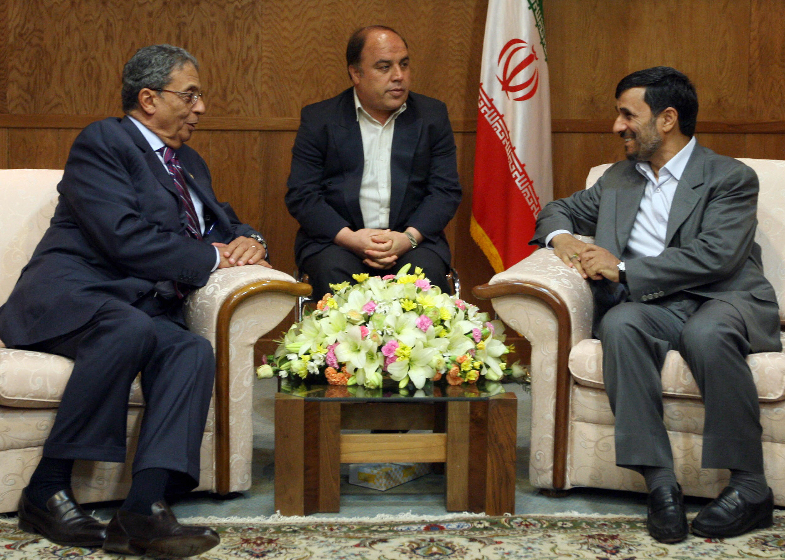Iranian President Mahmoud Ahmadinejad meets with Arab League Secretary General Amr Mussa (L). Iranian President Mahmoud Ahmadinejad meets with Arab League Secretary General Amr Mussa (L).