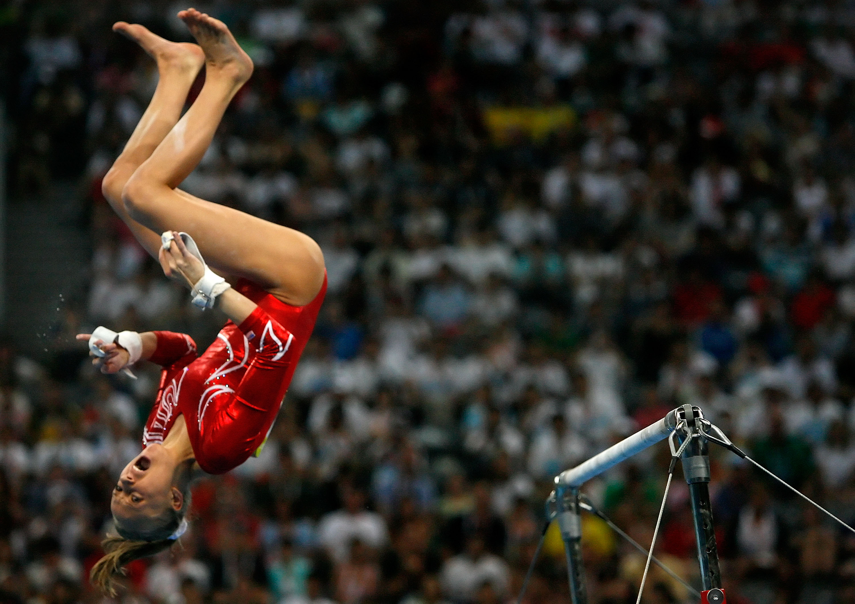 Nastia Liukin of the United States competes in the uneven bars. Nastia Liukin of the United States competes in the uneven bars.