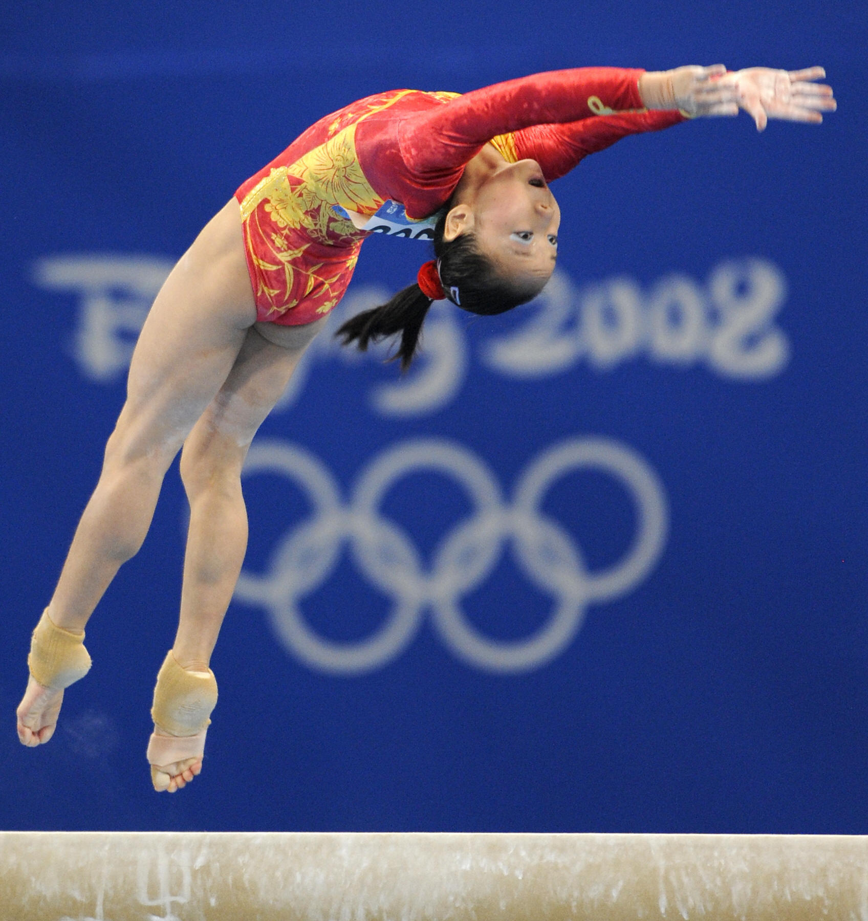 China's Deng Linlin competes on the beam. China's Deng Linlin competes on the beam.