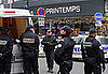 Front Page: Police Defuse Bomb in Paris Department Store 
