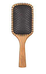 What Does a Paddle Brush Do?