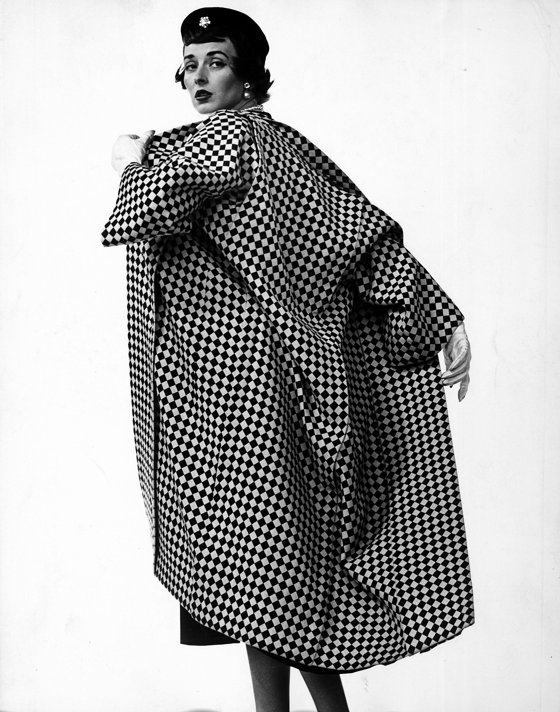 Dorian Leigh, Trigere coat, 1950. Dorian Leigh, Trigere coat, 1950.