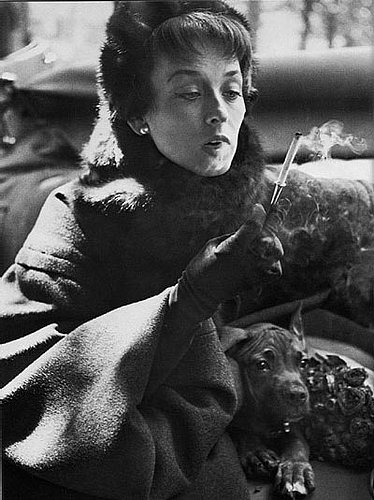 Dorian Leigh, Dior coat, photograph by Richard Avedon, Paris, 1949. Dorian Leigh, Dior coat, photograph by Richard Avedon, Paris, 1949.