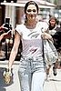 Emmy Rossum in LA Wearing a Message T-Shirt, Bow Belt, and Light Wash Jeans